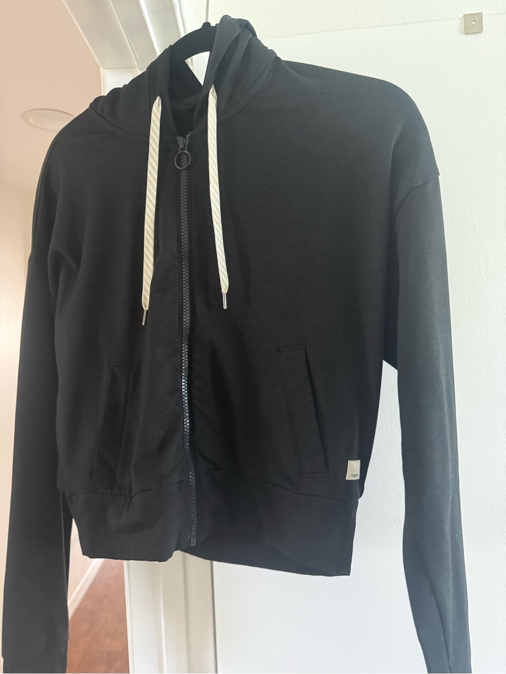 Vuori Black Zip-Up Hoodie with White Drawstrings